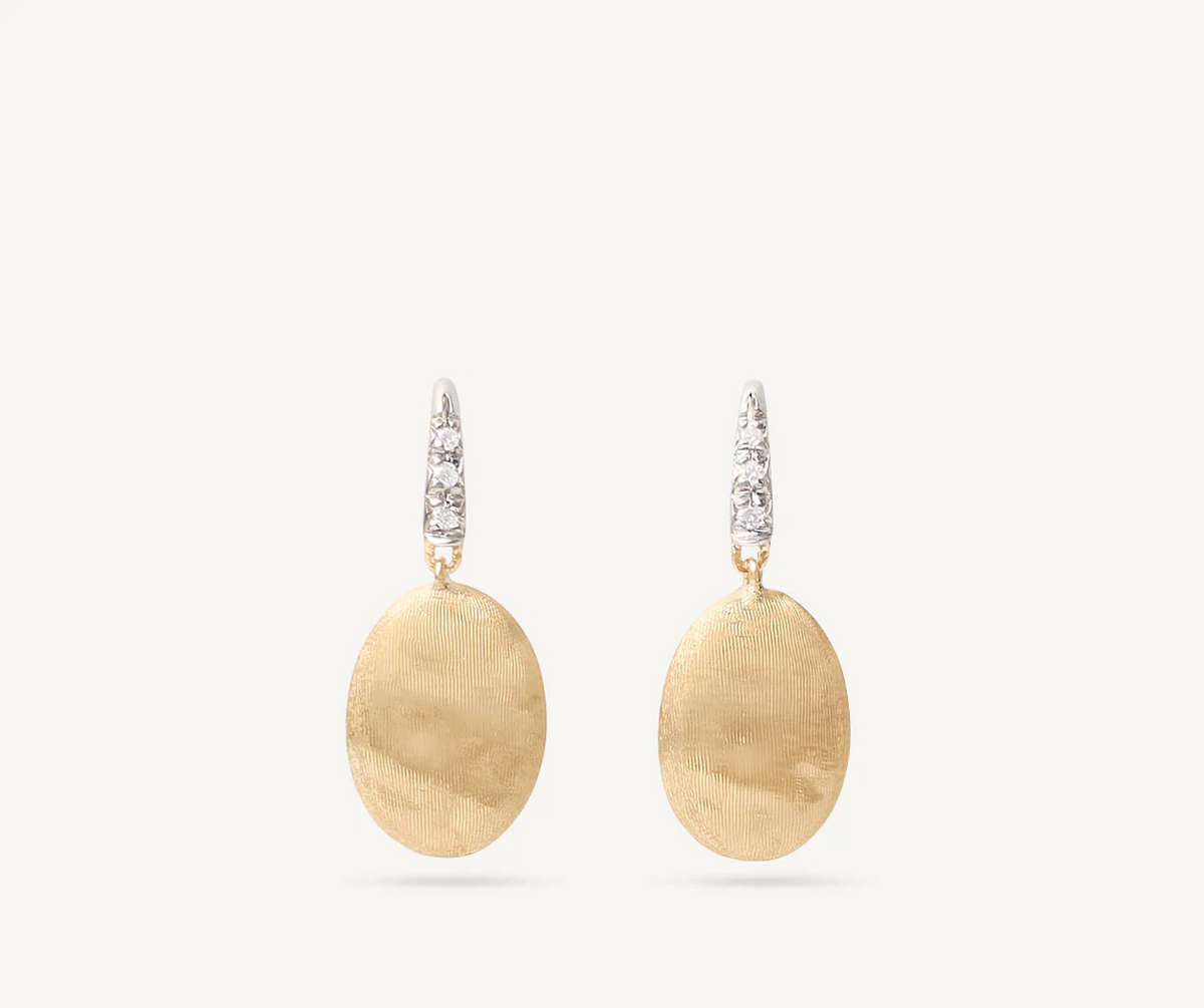 Siviglia yellow gold drops with diamonds set in white gold and french hooks by Marco Bicego
